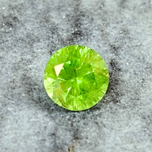 Load image into Gallery viewer, 0.84 Carat Round Brilliant Cut Demantoid Garnet from the Ural Mountains
