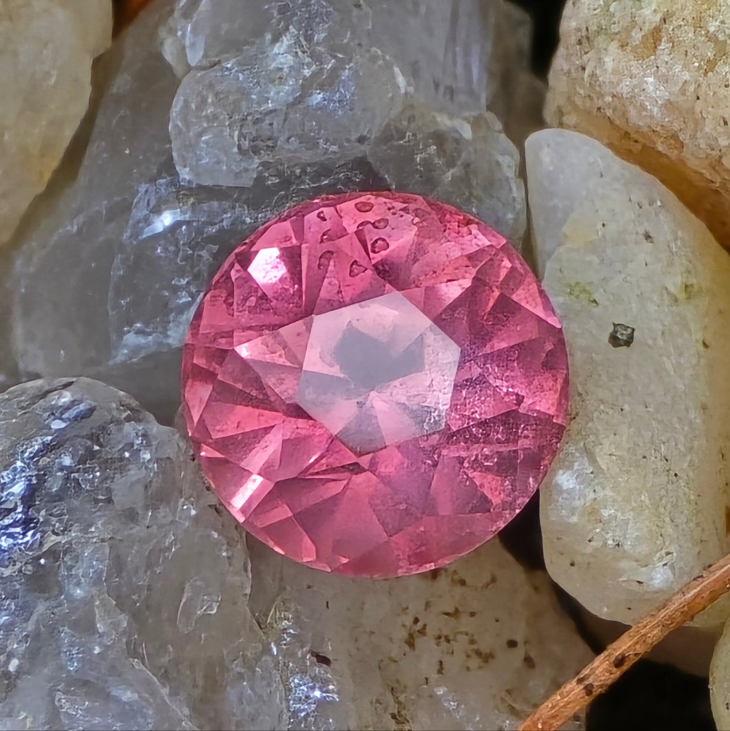 0.84 Carat round untreated peach sapphire from Umba Valley Tanzania