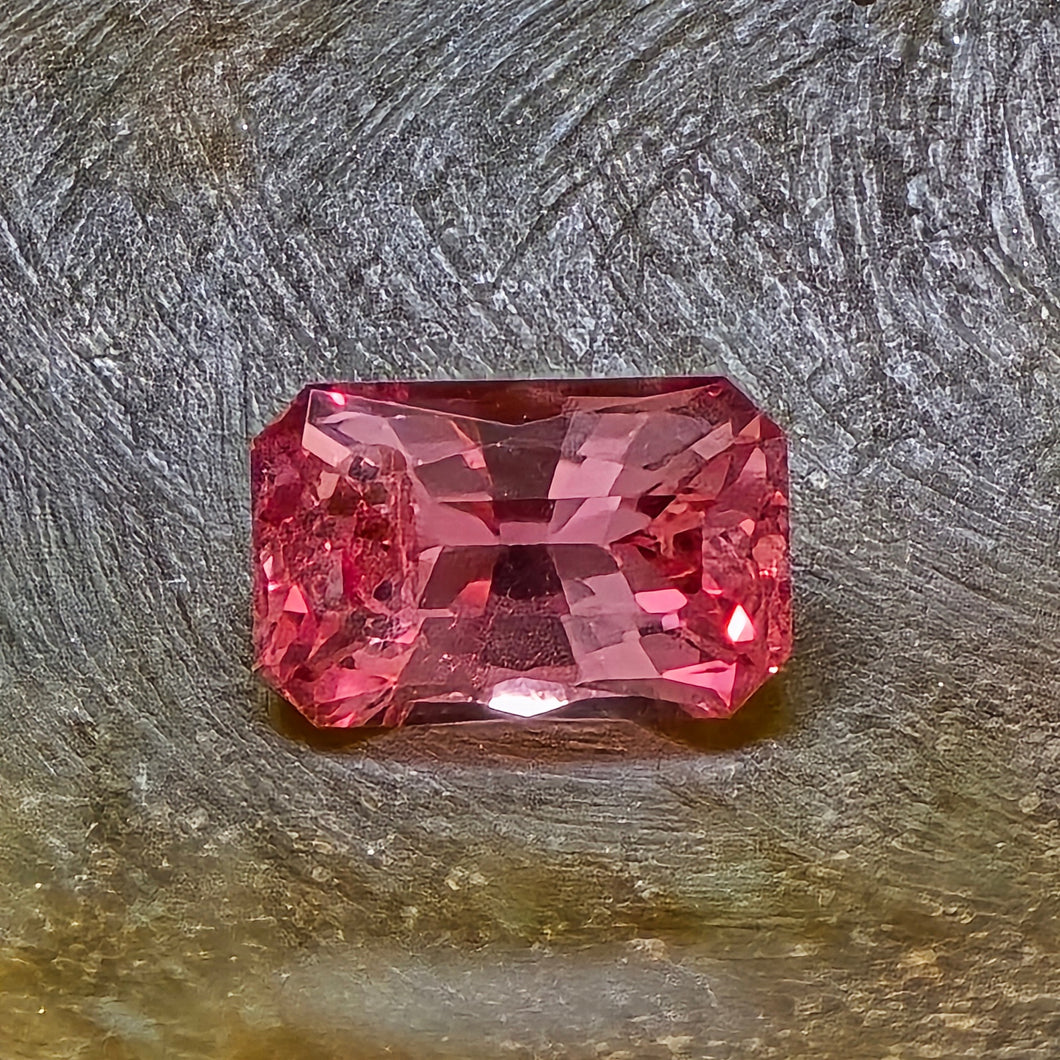 0.77 Carat radiant cut untreated peach sapphire from Madagascar