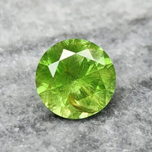 Load image into Gallery viewer, 0.84 Carat Round Brilliant Cut Demantoid Garnet from the Ural Mountains

