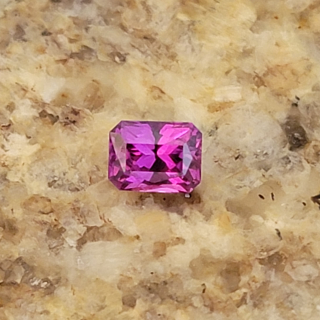 0.80Ct Rectangular Radiant Cut Purple Untreated Sapphire